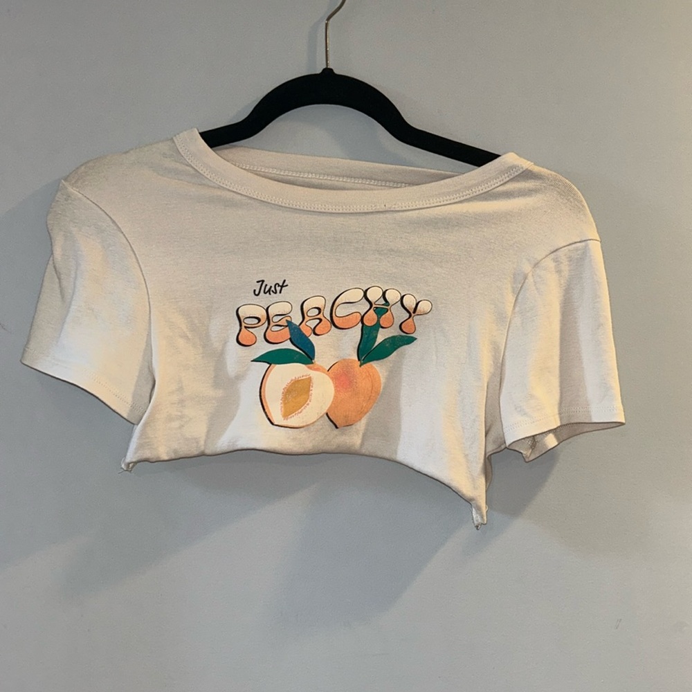 peach color crop top graphic tee